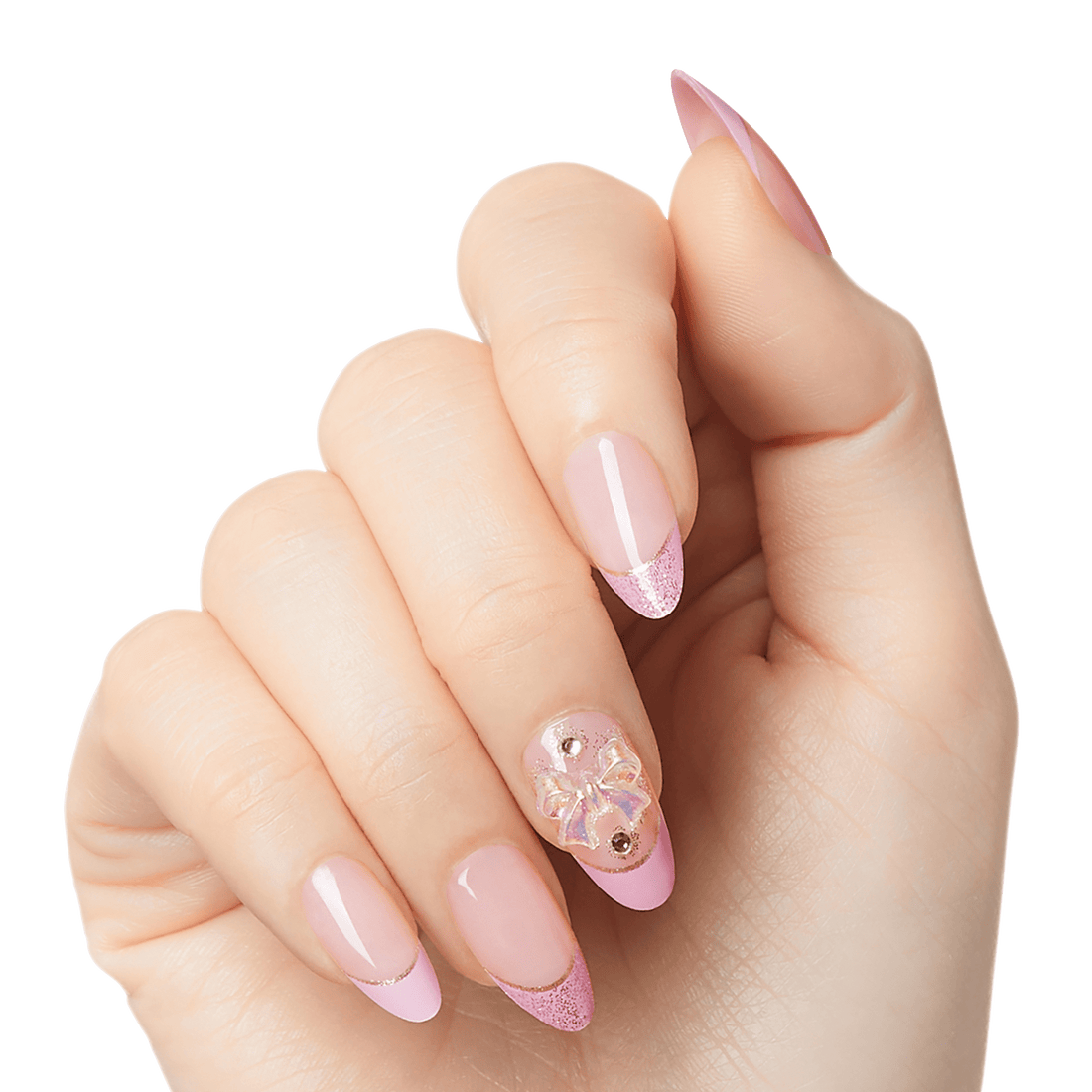 Hand showing KISS Majestic Dream press-on glue nails in Maestro style, featuring pink tips with glitter and a 3D bow with rhinestones on the ring finger.