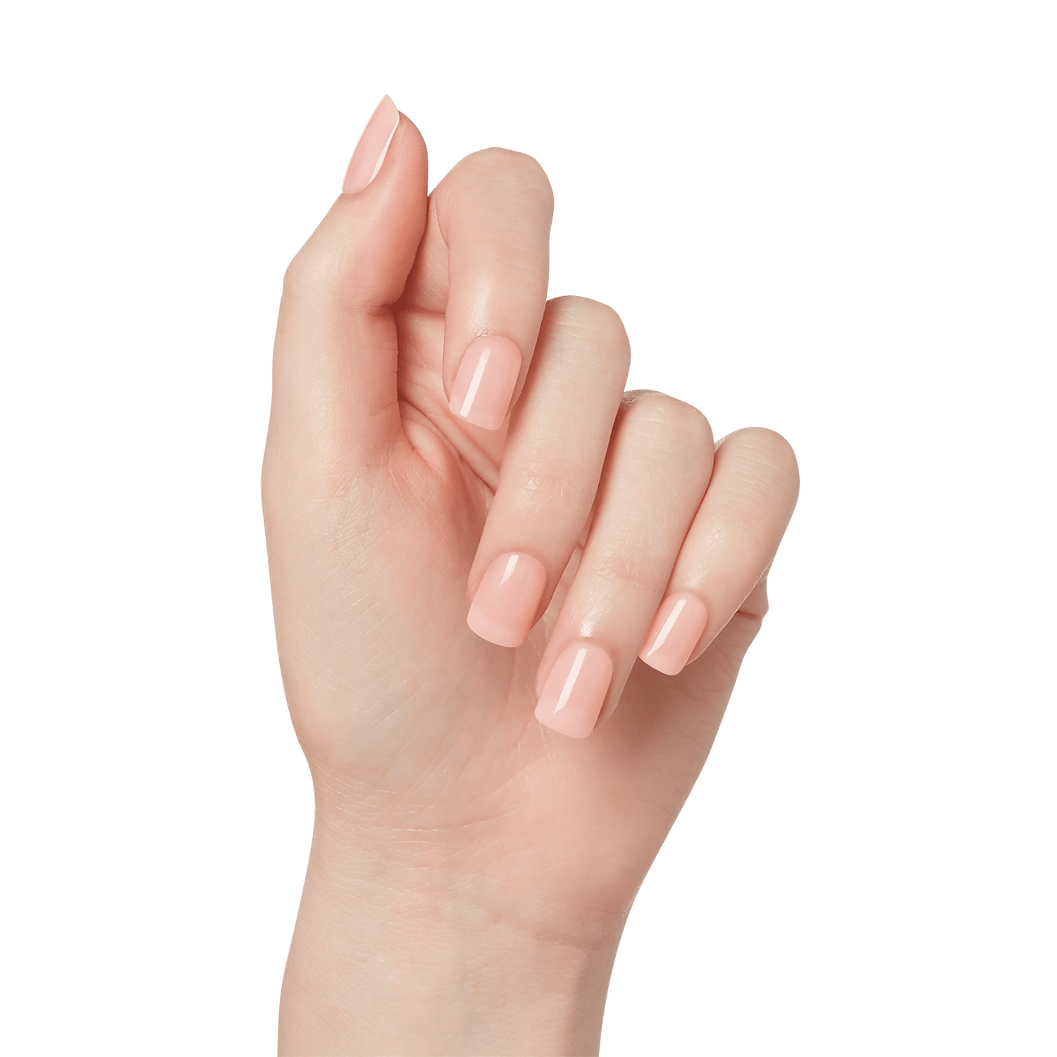 Hand with square-shaped press on nails in a soft, pale pink color called Instinct, showing a glossy natural manicure look.