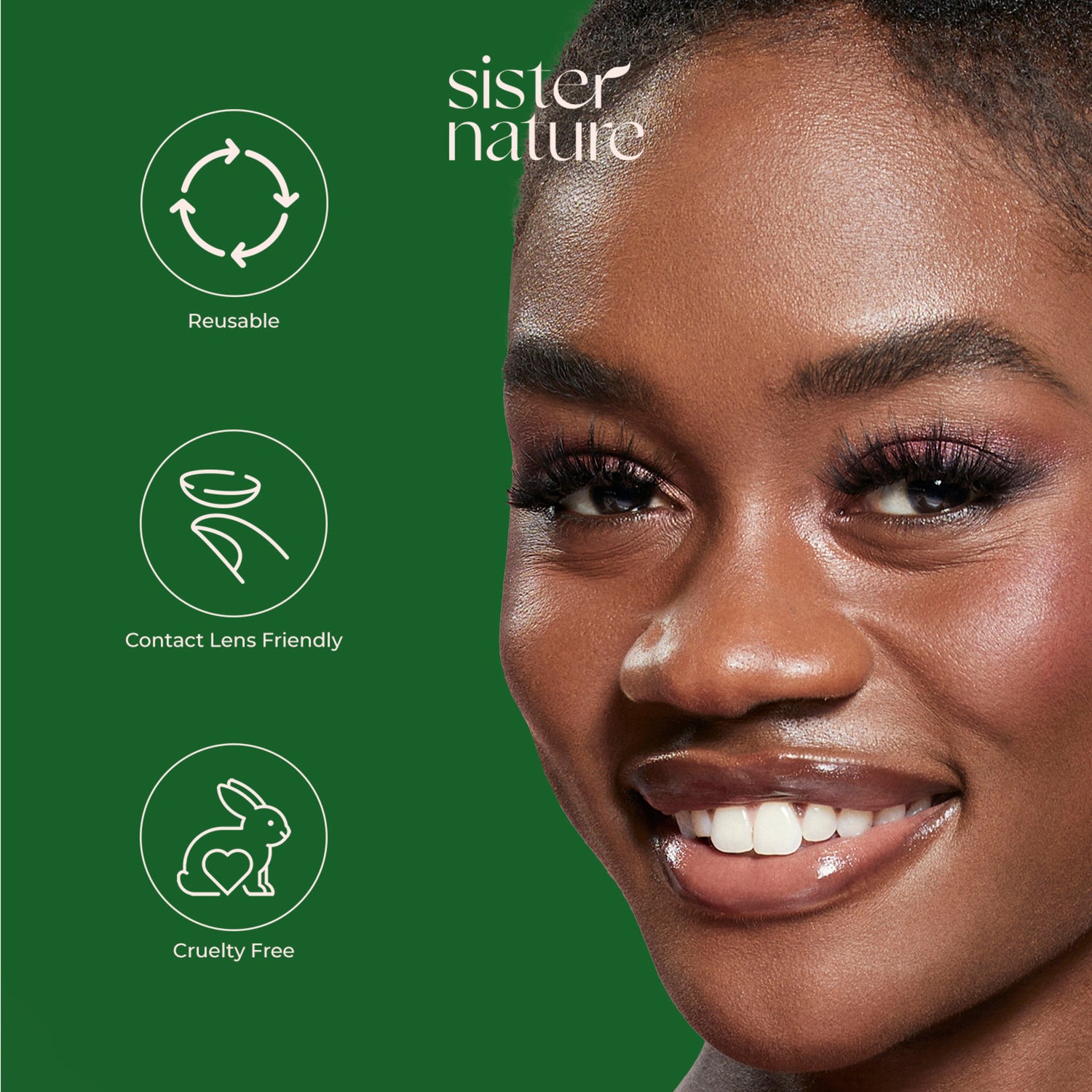 Close-up of a smiling woman with dark skin wearing full, fluttery false eyelashes against a green background featuring text and icons for reusable, contact lens friendly, and cruelty free. The brand name \