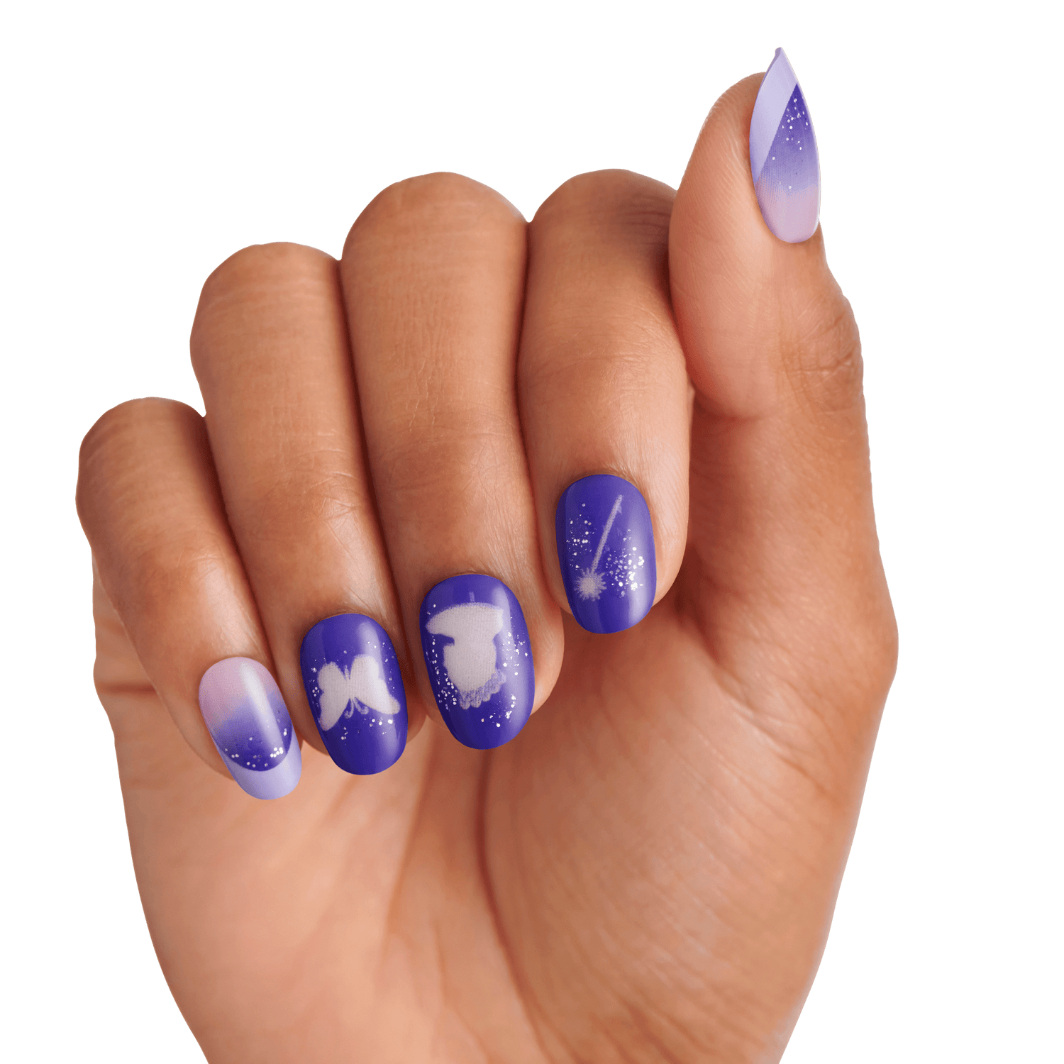 Hand with medium-length nails painted in purple and lavender gradient, featuring white silhouettes of a butterfly, a witch hat, and a magic wand with sparkles.