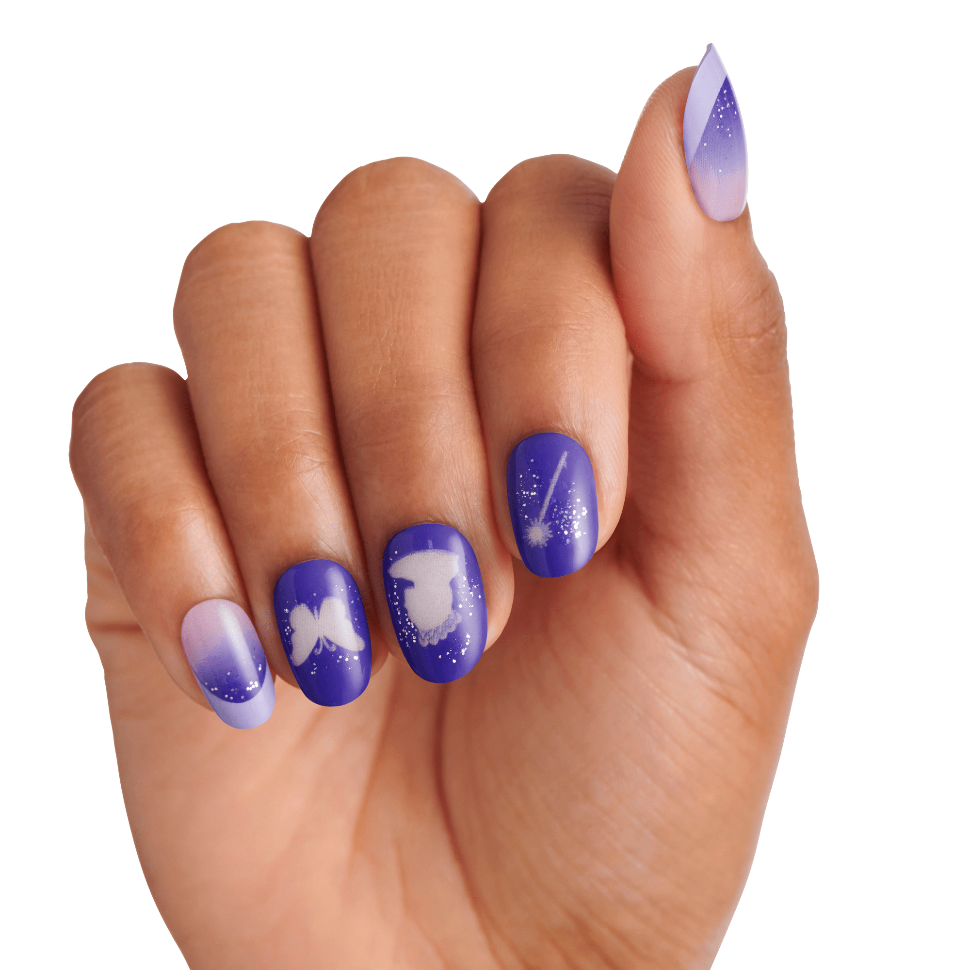 Hand with medium-length nails painted in purple and lavender gradient, featuring white silhouettes of a butterfly, a witch hat, and a magic wand with sparkles.