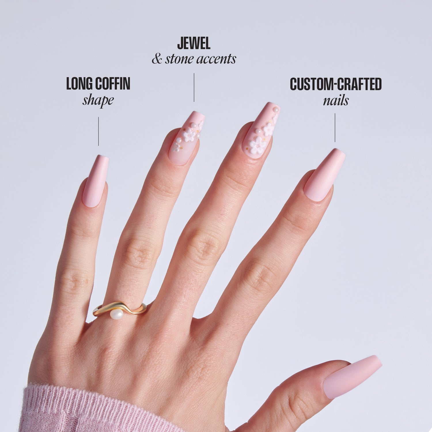 Four nail designs featuring long coffin shape, jeweled accents, and custom-crafted styling with gold ring.