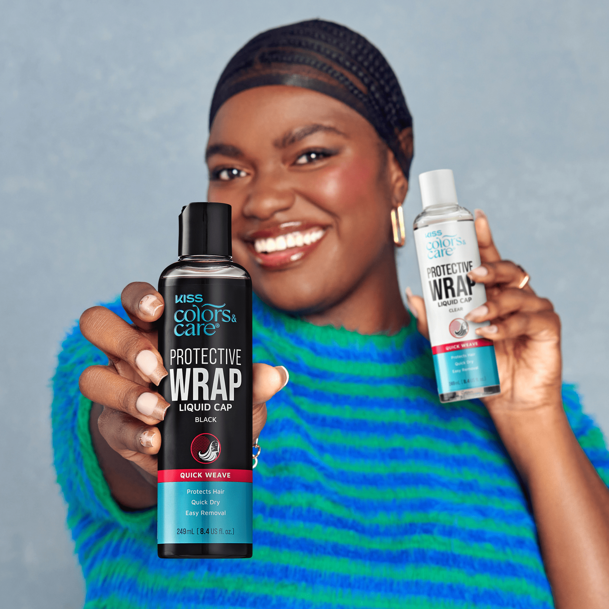 Person smiling and holding two bottles of KISS Colors &amp; Care Protective Wrap Liquid Cap, one black and one clear, stating "Quick Weave, Protects Hair, Quick Dry, Easy Removal."