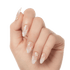 Hand showing almond-shaped press-on gel nails with a natural pink base and white daisy flowers with yellow centers as the design.