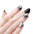 Hand with matte press-on nails in mocha and black colors, featuring black butterfly designs and black polka dots on a light gray background.