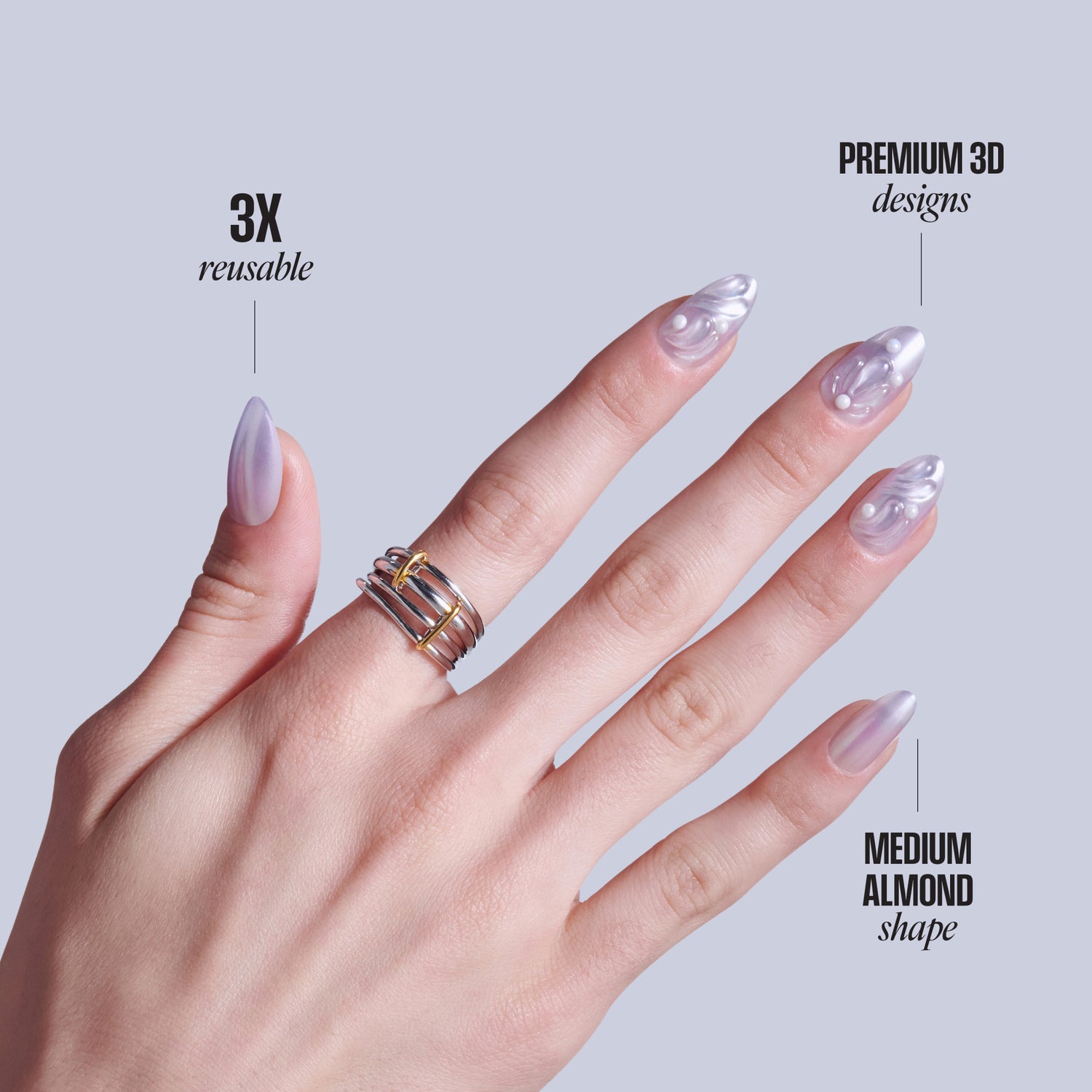 Reusable press-on nails in medium almond shape with purple swirl 3D designs.