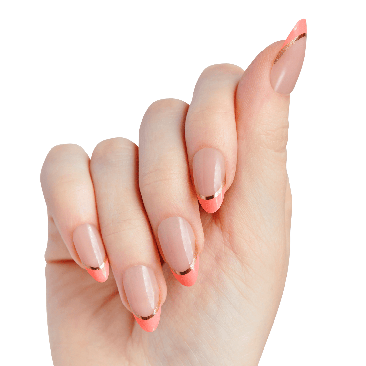 Hand with almond-shaped nails painted in nude pink with coral tips and thin metallic gold stripes along the edges.