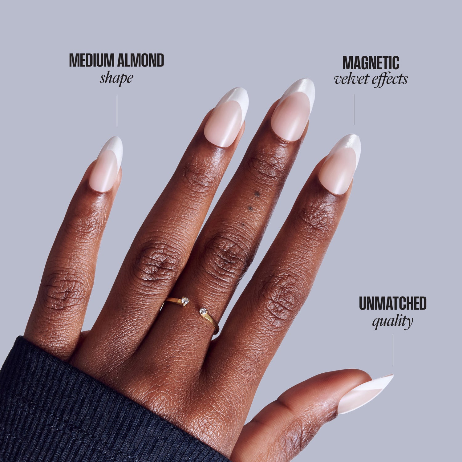 Medium almond nails with white tips, magnetic velvet effects, and unmatched quality on dark skin tone.