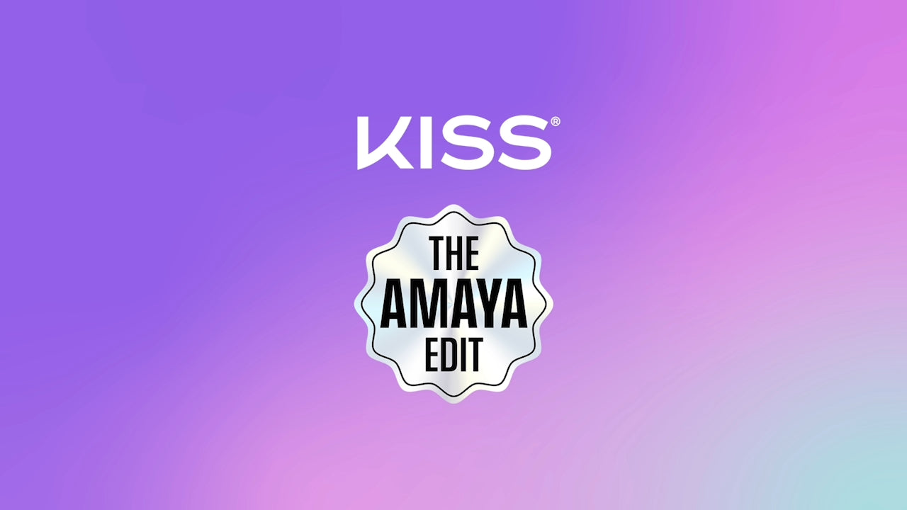 Video of a woman trying on Kiss products