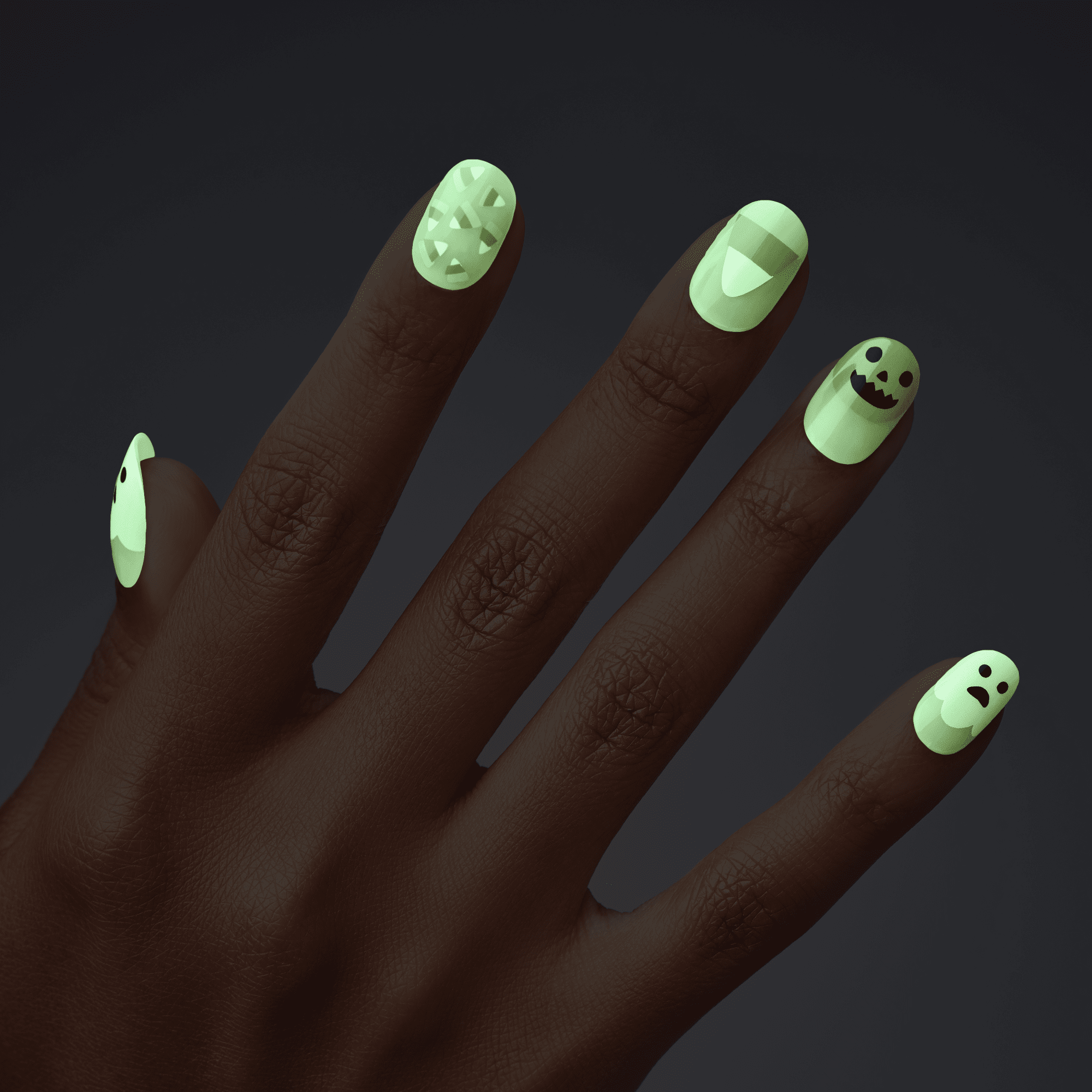 Dark-skinned hand with glow-in-the-dark press-on nails featuring spooky Halloween designs: mummy wraps, a vampire mouth, a jack-o&