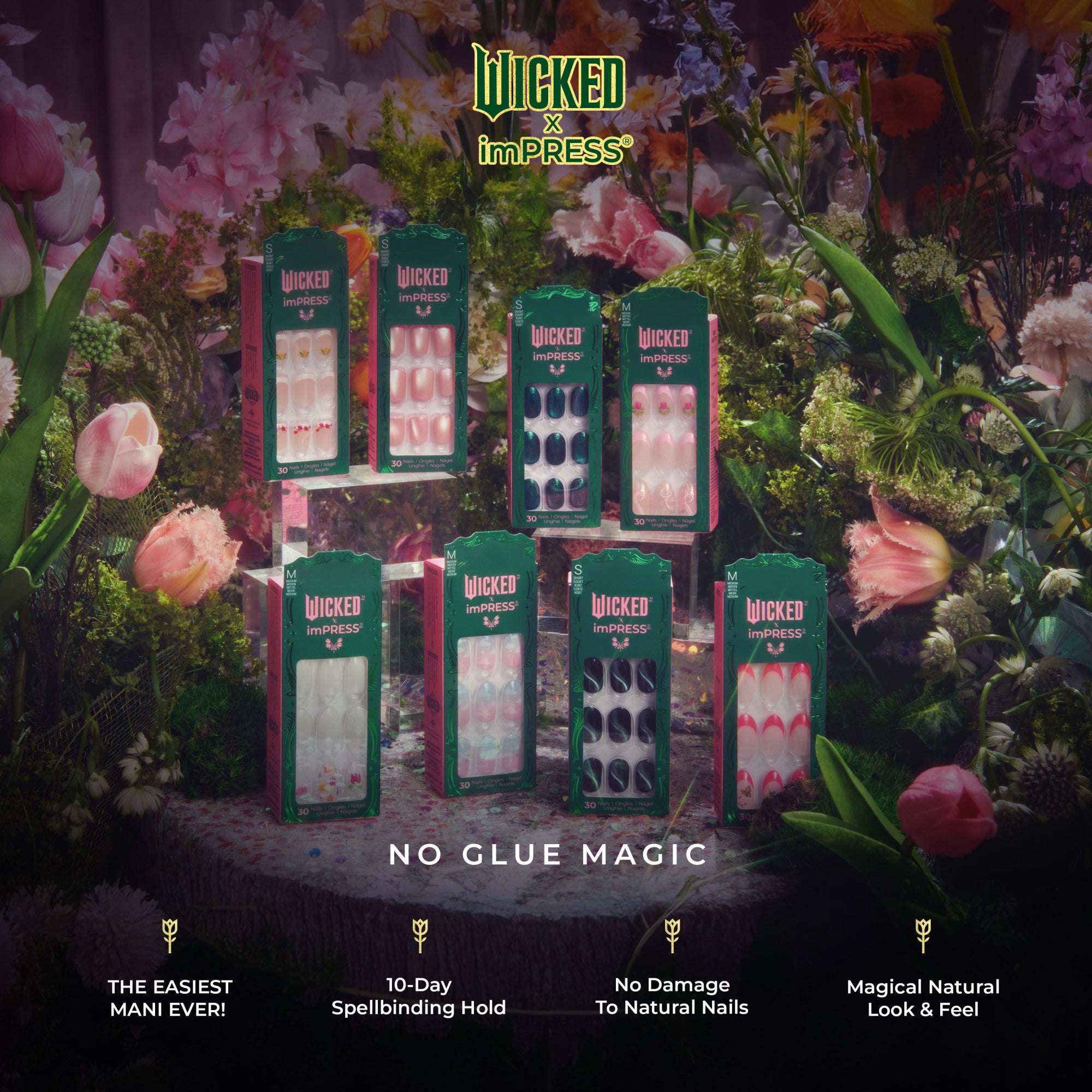 Seven packs of WICKED X imPRESS press-on nails in varied colors and designs are displayed on clear stands surrounded by flowers.