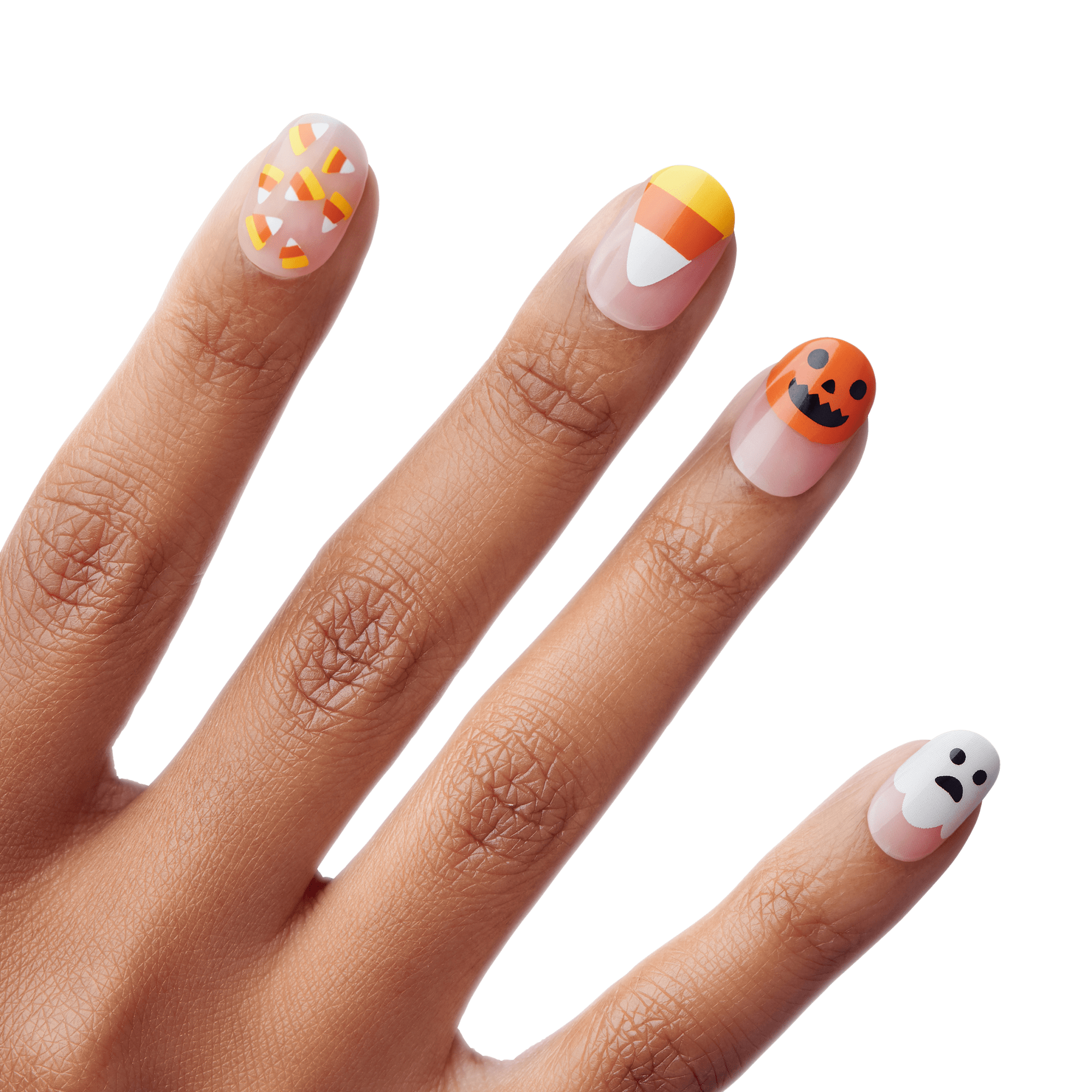 Hand with Halloween-themed press-on nails showing candy corn, a large candy corn tip, a jack-o&