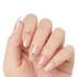 Hand with press-on nails featuring a nude base, rose gold glitter lines, silver rhinestones on middle nails, and white geometric designs on thumb and pinky.
