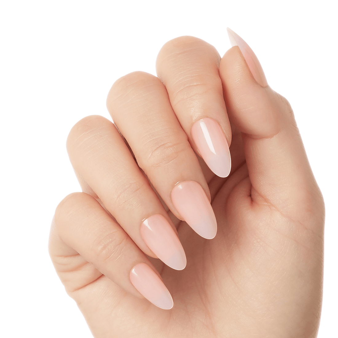 Hand with five long, almond-shaped press-on gel nails in a glossy, soft nude pink shade, displayed against a white background.