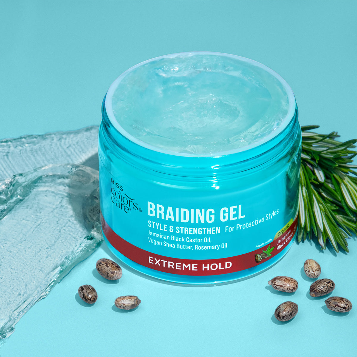 Open turquoise jar of Kiss Colors &amp; Care Braiding Gel with clear gel inside, surrounded by castor beans and rosemary sprig; labeled for extreme hold and strengthening.