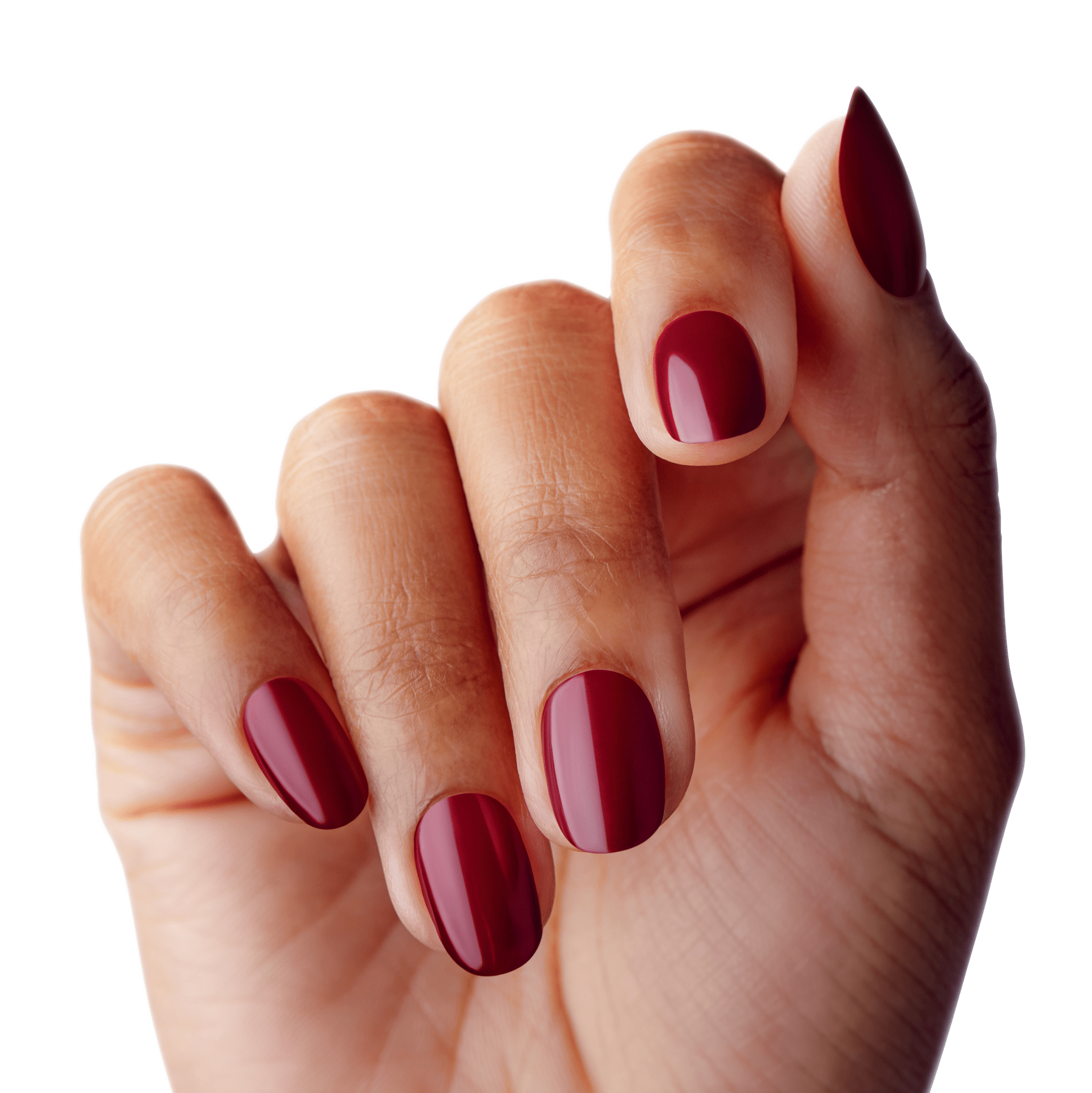 Close-up of a hand with medium-length, oval-shaped press-on nails in a rich, glossy deep red color.