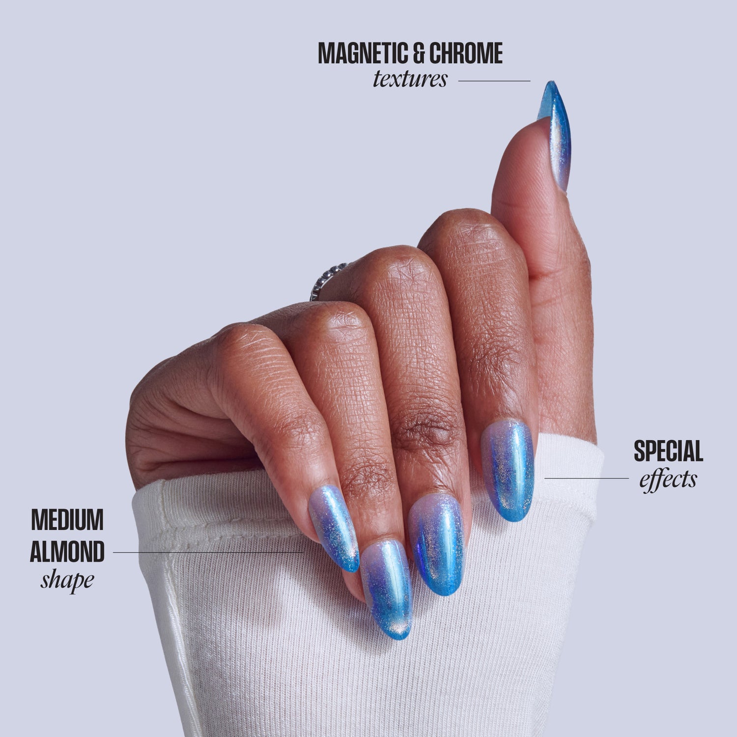 Medium almond nails with blue magnetic and chrome textures showing special effects.