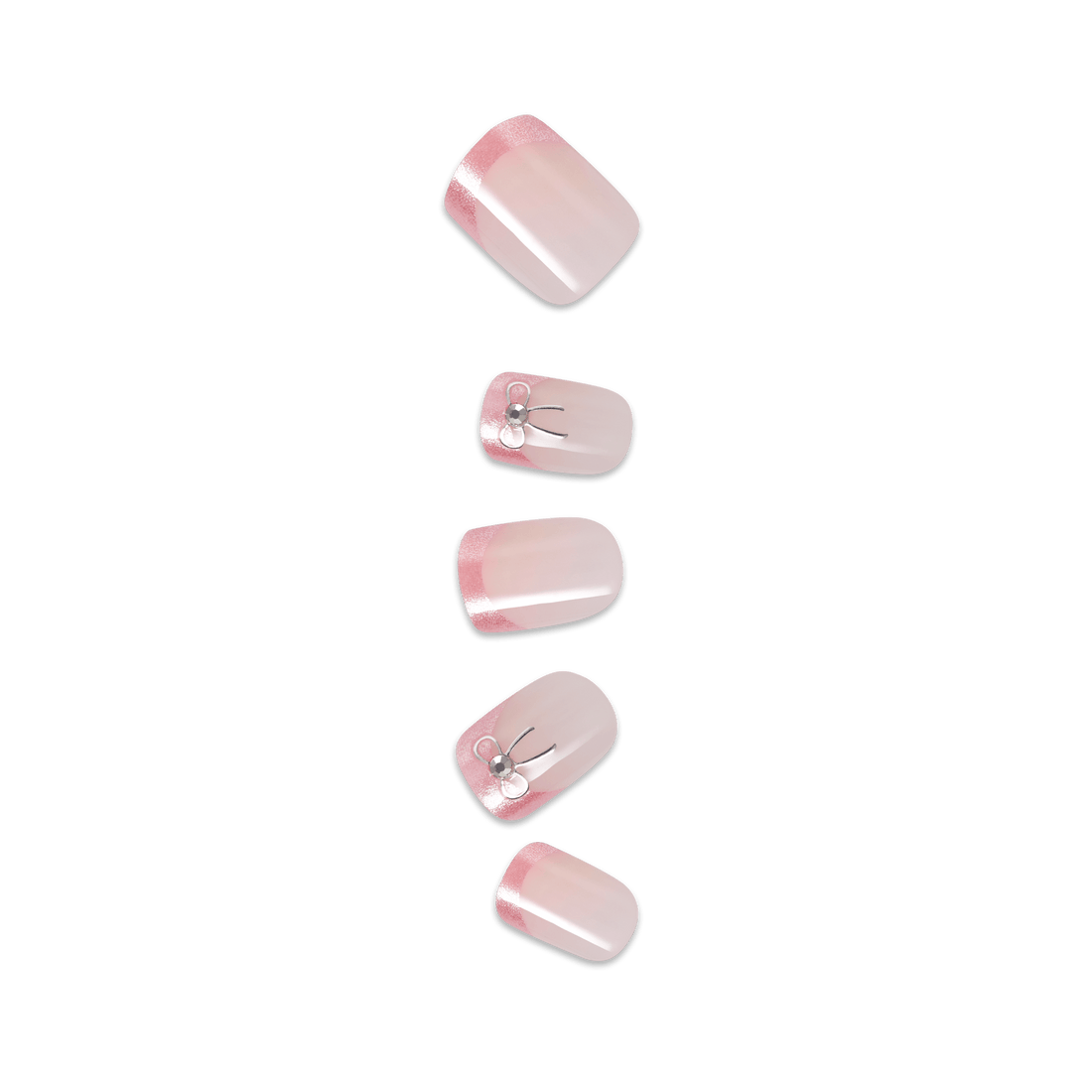 Five pink ombre press-on nails with floral rhinestone accents and white stripes.