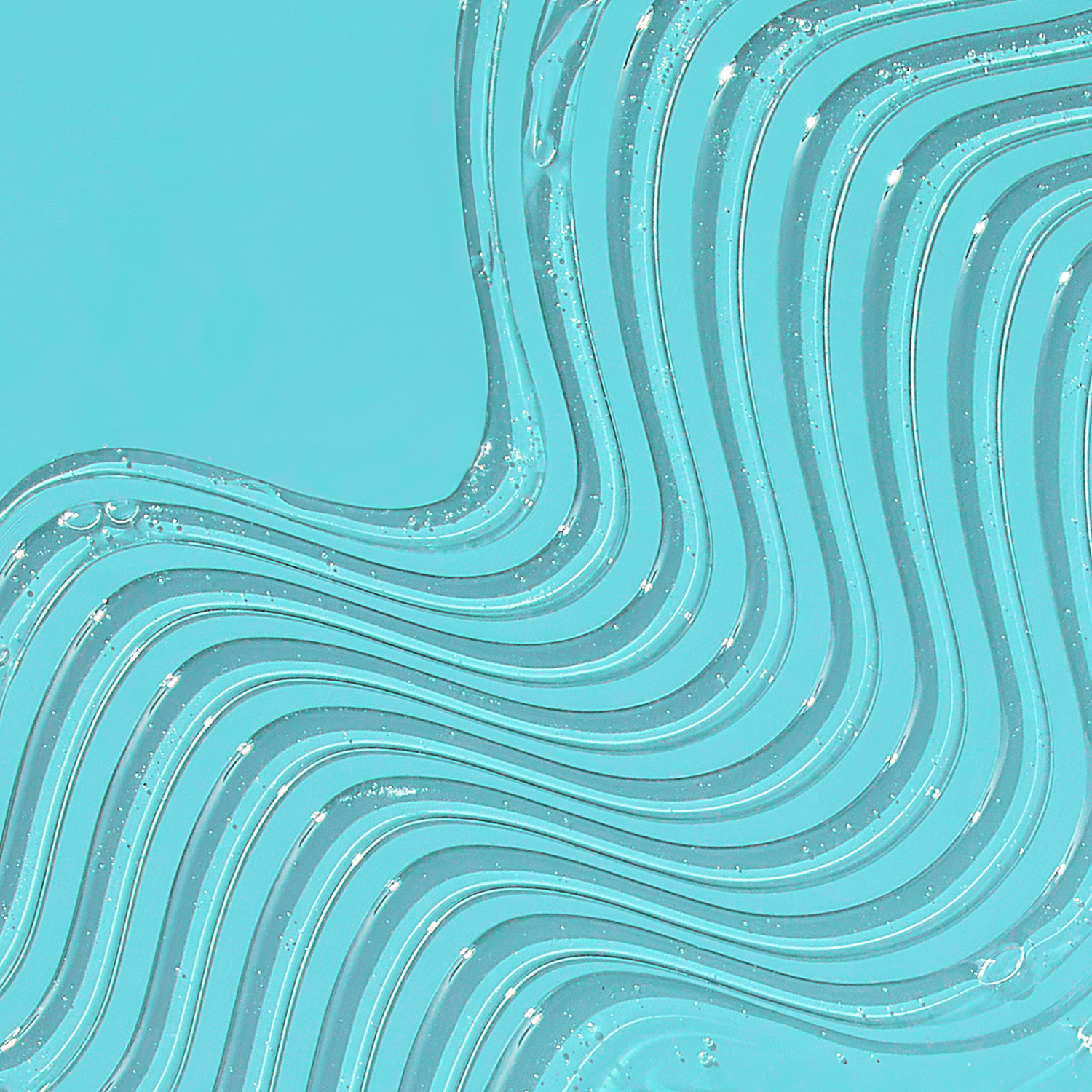 Clear gel-like liquid with swirling textured lines and small bubbles on a bright blue background, suggesting a smooth, protective cosmetic product.