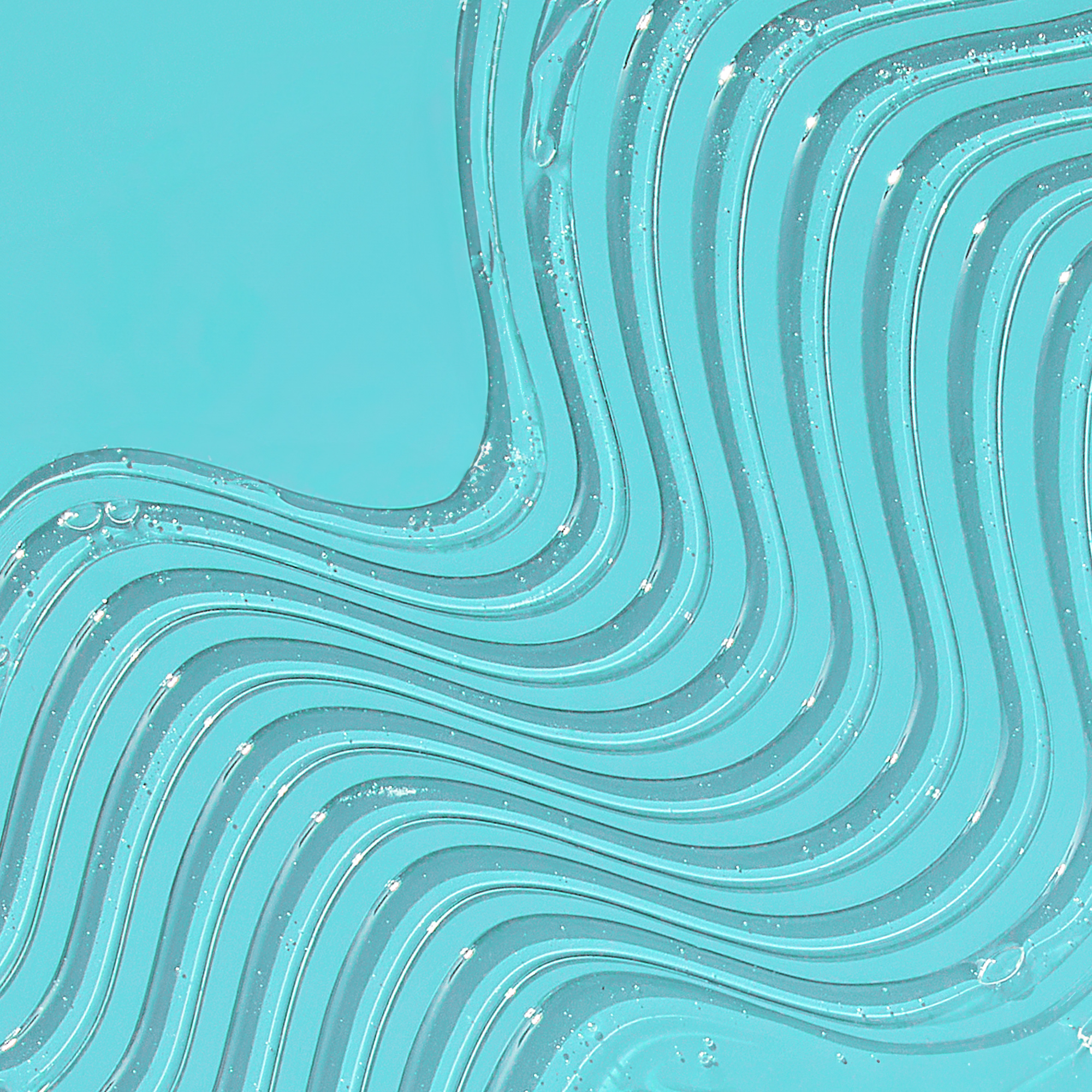 Clear gel-like liquid with swirling textured lines and small bubbles on a bright blue background, suggesting a smooth, protective cosmetic product.